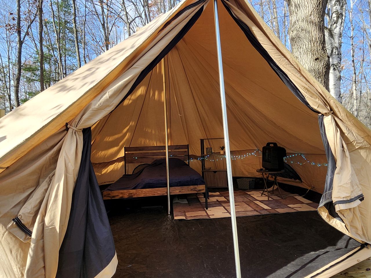 Cozy Bell Tent Glamping on Private Fenced Deck with Bathhouse Firepit WiFi and Trails in Mio, Michigan