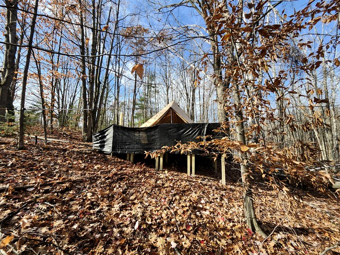 Cozy Bell Tent Glamping on Private Fenced Deck with Bathhouse Firepit WiFi and Trails in Mio, Michigan