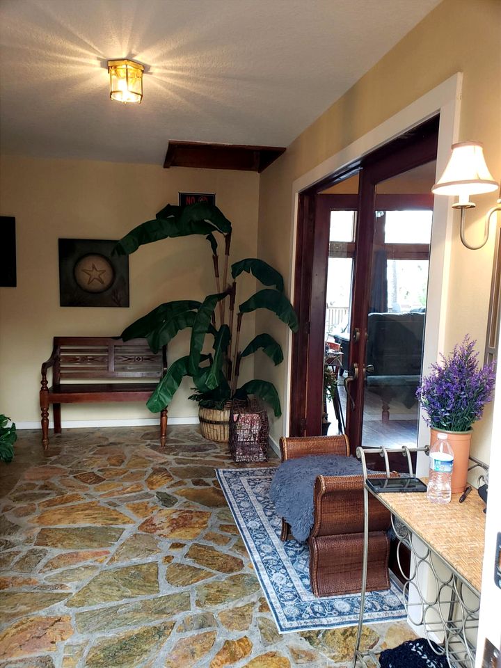 A-Frame Cabin Rental with Spacious Deck Overlooking the Cotee River, Florida