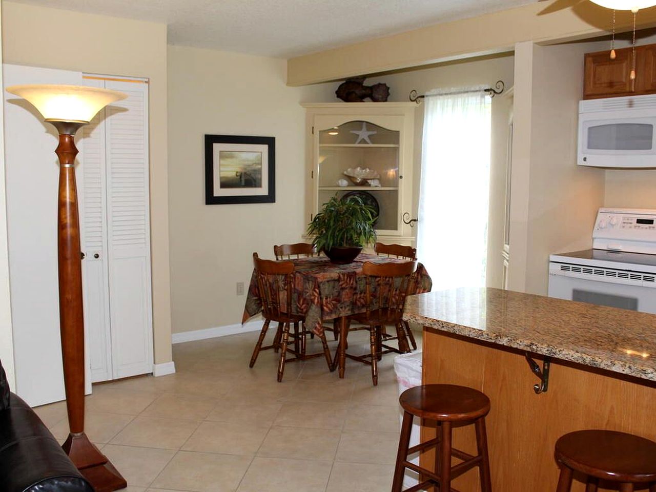 A-Frame Cabin Rental with Spacious Deck Overlooking the Cotee River, Florida