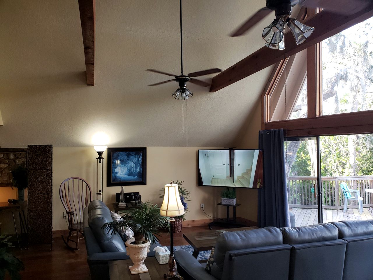 A-Frame Cabin Rental with Spacious Deck Overlooking the Cotee River, Florida