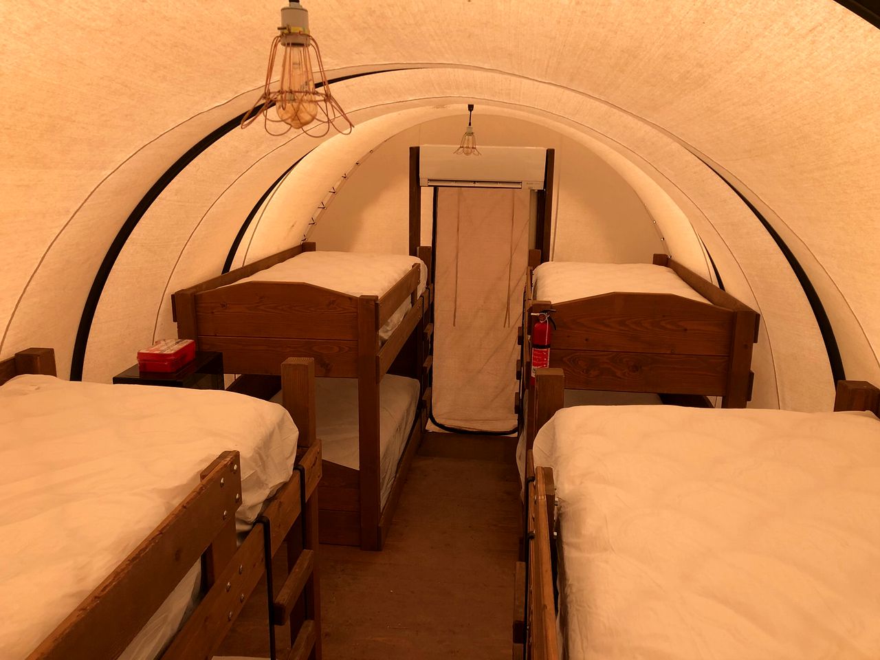 Perfect Glamping Vacations in this Rustic Conestoga Covered Wagon Rental in Oklahoma