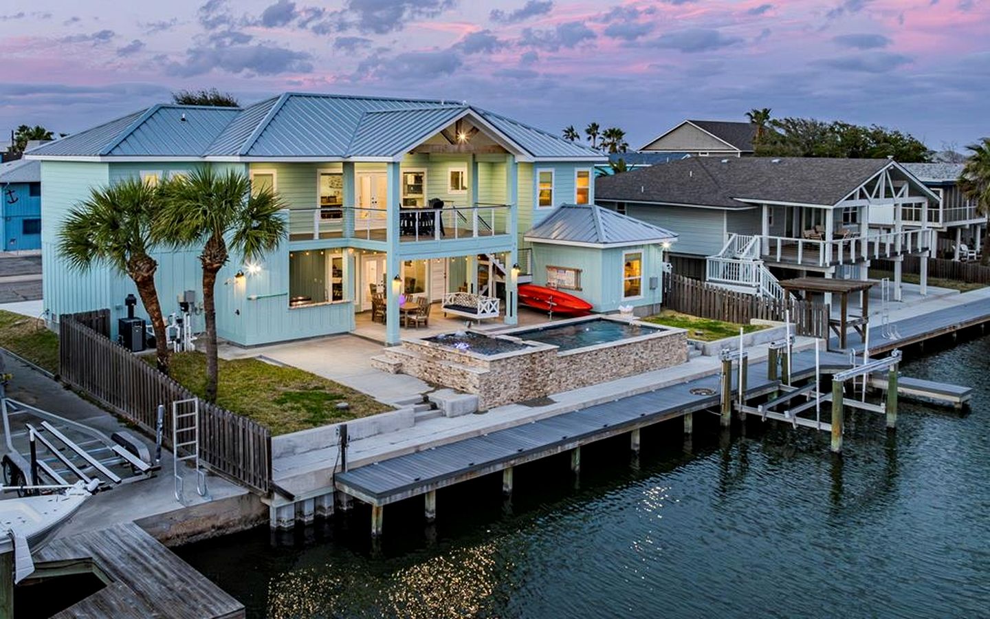 Stylish Waterfront Getaway with Private Dock, Pool, and Game Room near Rockport Beach, Texas