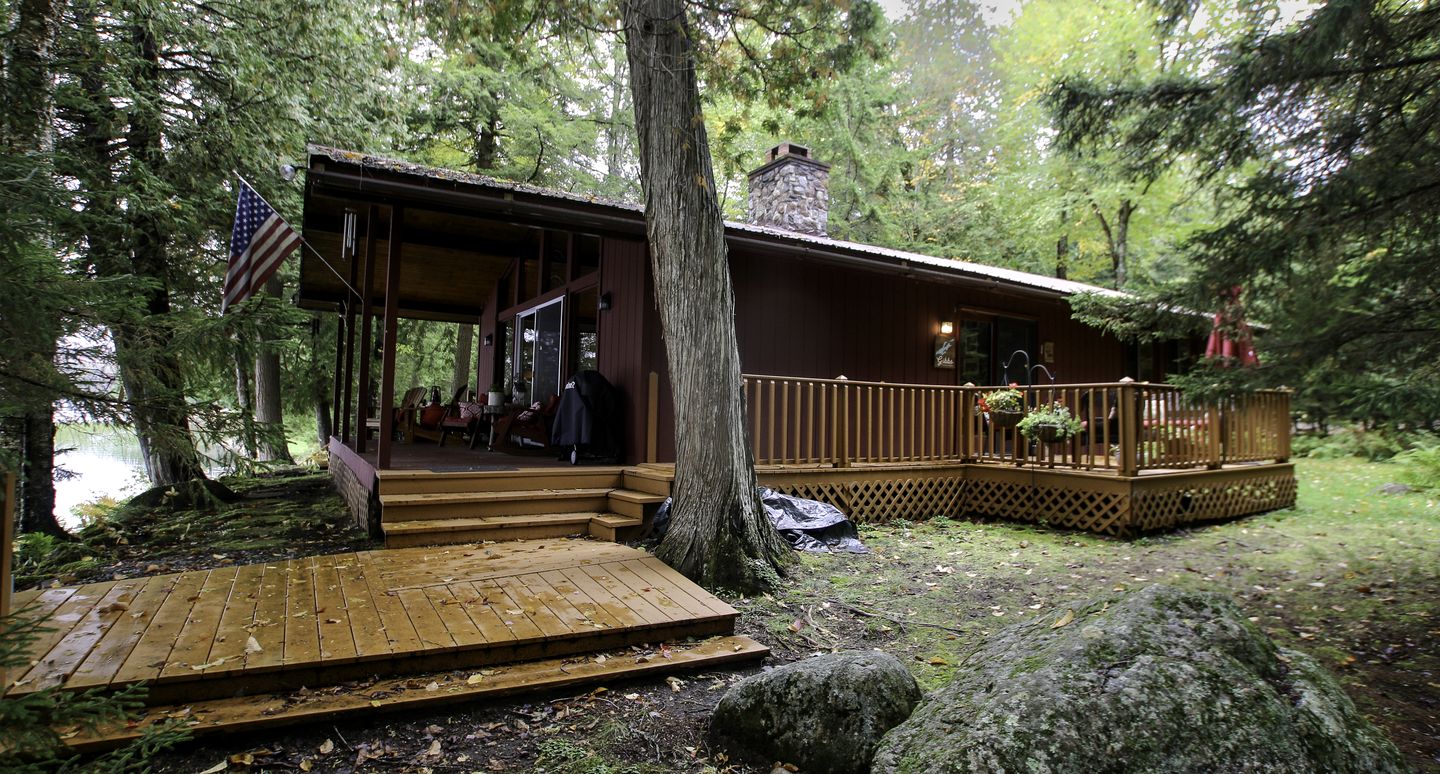 Cozy Cottage Surrounded by Trees with Private Dock for a Peaceful Escape by Big Moose Lake in New York