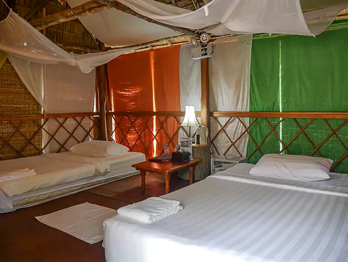 Authentic Elevated Hut Accommodations Surrounded by Trees in Cambodia | Huts (Kompong Hau, Kampong Speu Province, Cambodia)