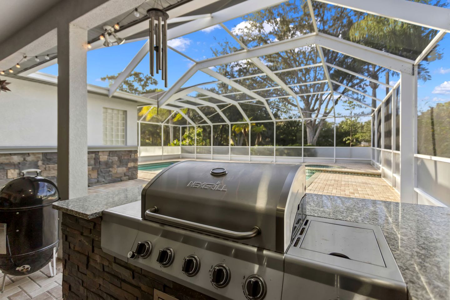 Modern Spacious Getaway: Heated Pool, Movie Room, Huge Yard & Event-Friendly in New Port Richey, Florida