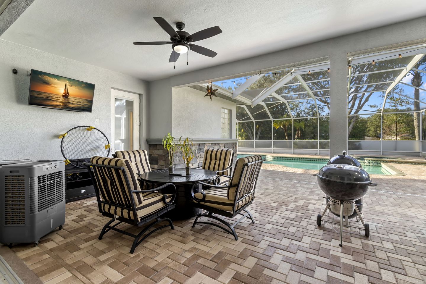 Modern Spacious Getaway: Heated Pool, Movie Room, Huge Yard & Event-Friendly in New Port Richey, Florida