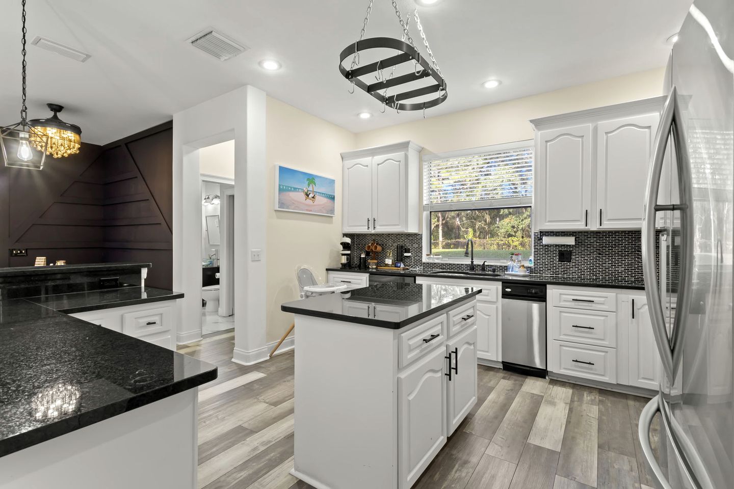 Modern Spacious Getaway: Heated Pool, Movie Room, Huge Yard & Event-Friendly in New Port Richey, Florida