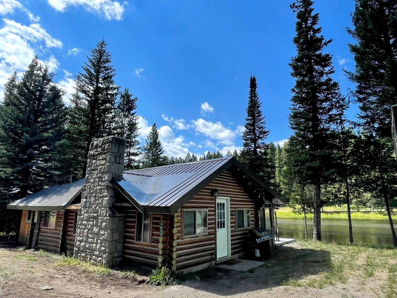 Charming Riverfront Cabin with Hot Tub and Dock Access Near Scenic Trails in Island Park, Idaho
