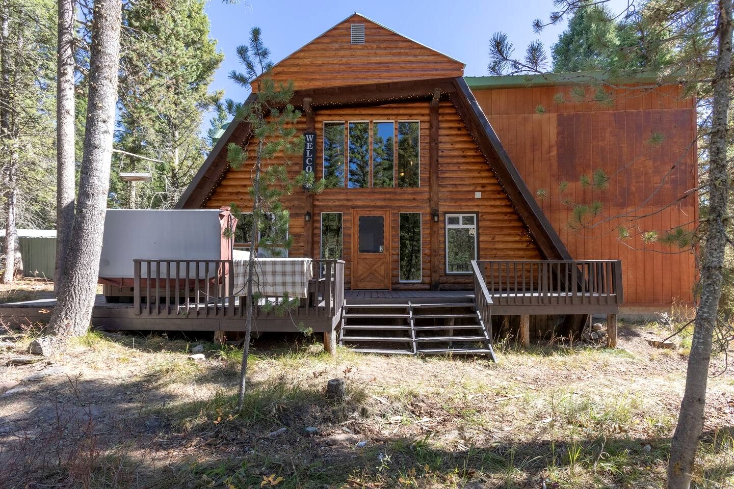 Spacious Rustic Cabin with Hot Tub and Game Loft Near Trails in Island Park, Idaho