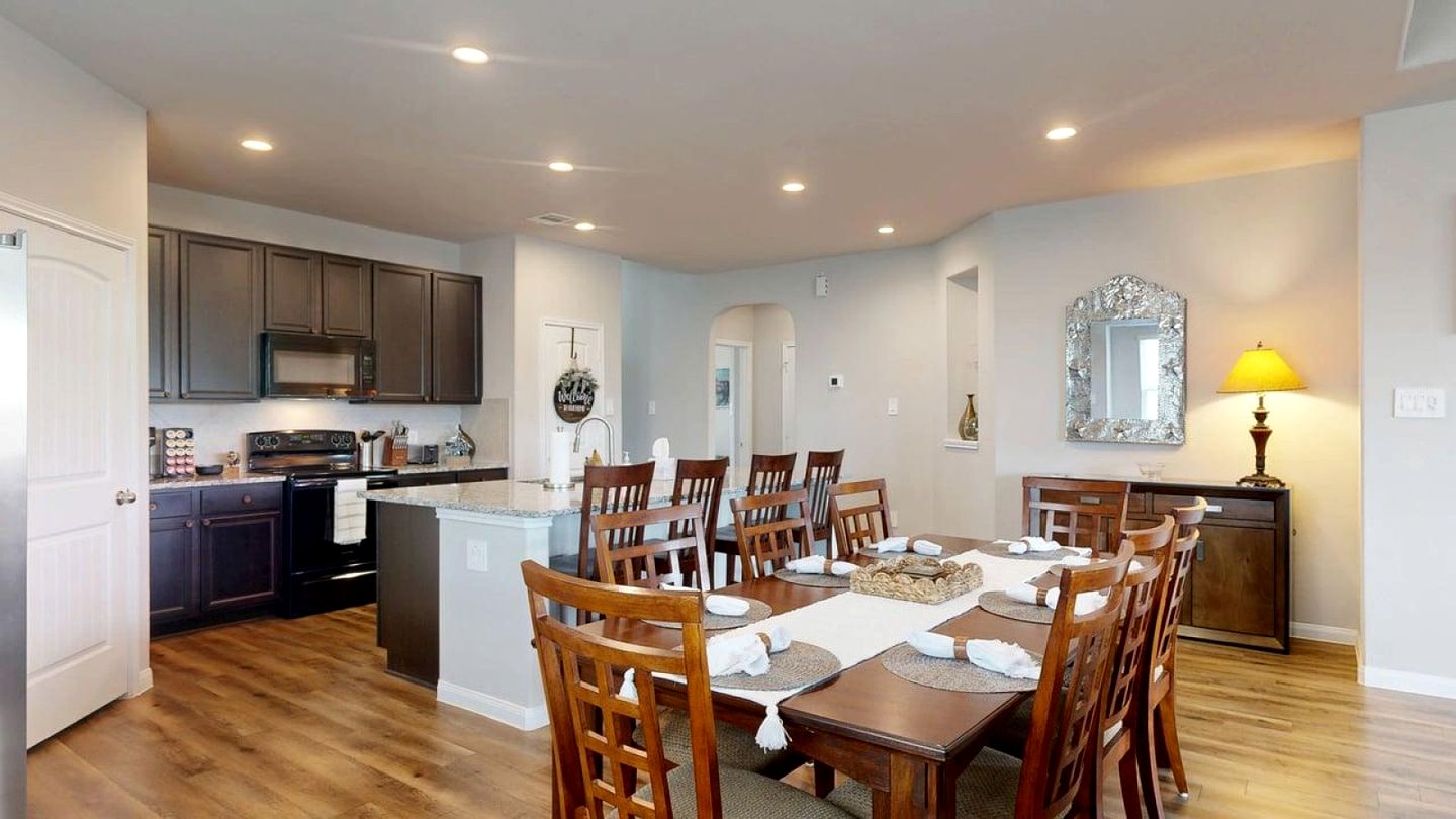 Serene Backyard Escape with Covered Porch in Bryan, Texas