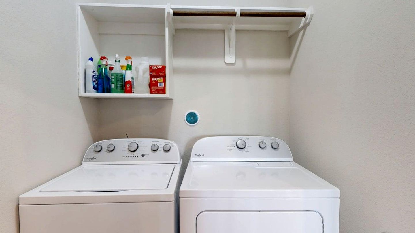 Serene Backyard Escape with Covered Porch in Bryan, Texas