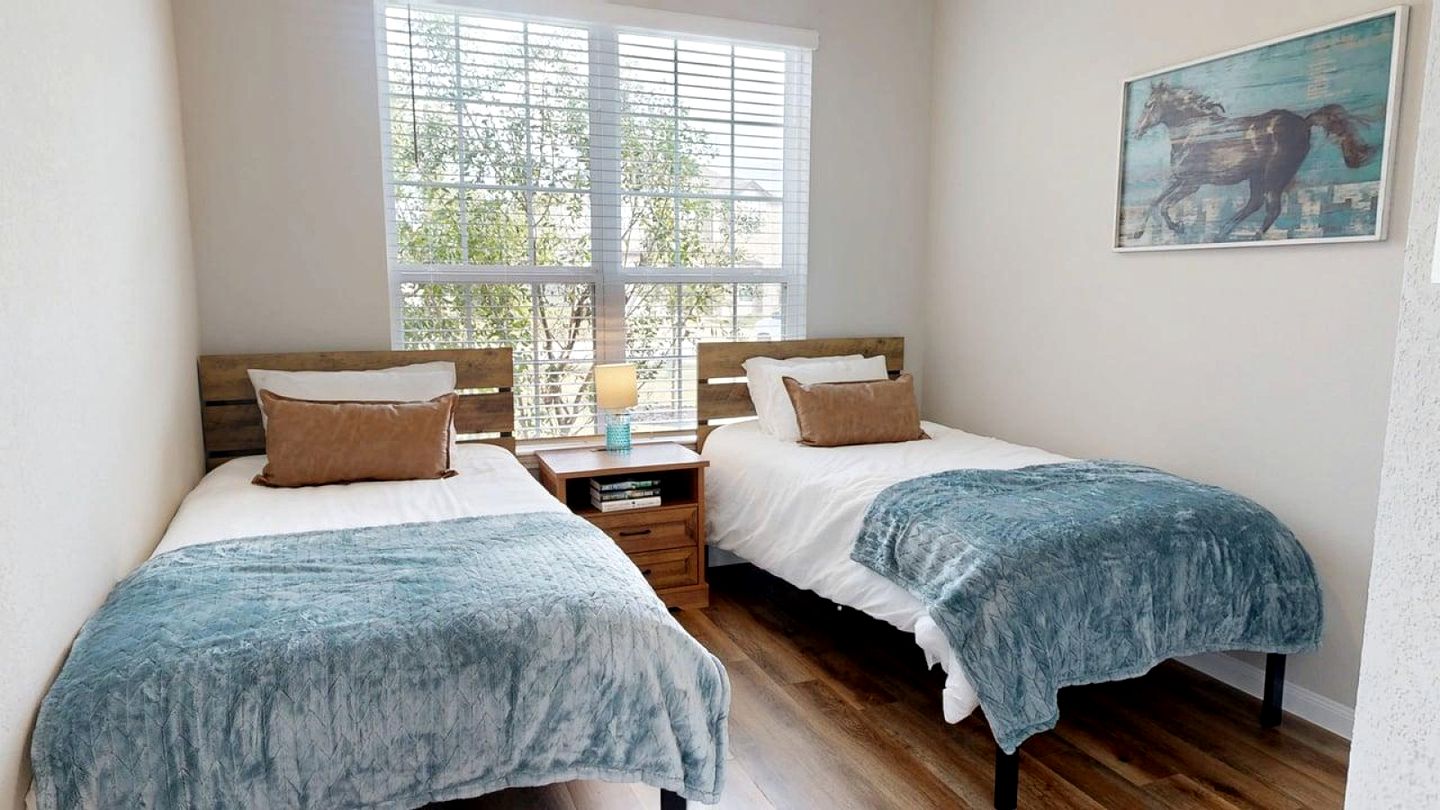 Serene Backyard Escape with Covered Porch in Bryan, Texas