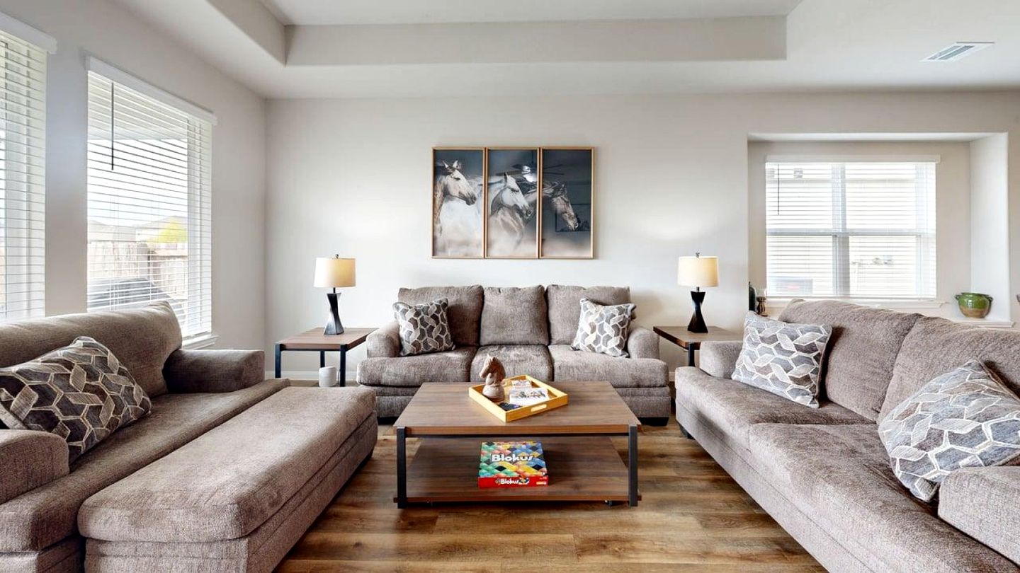 Serene Backyard Escape with Covered Porch in Bryan, Texas