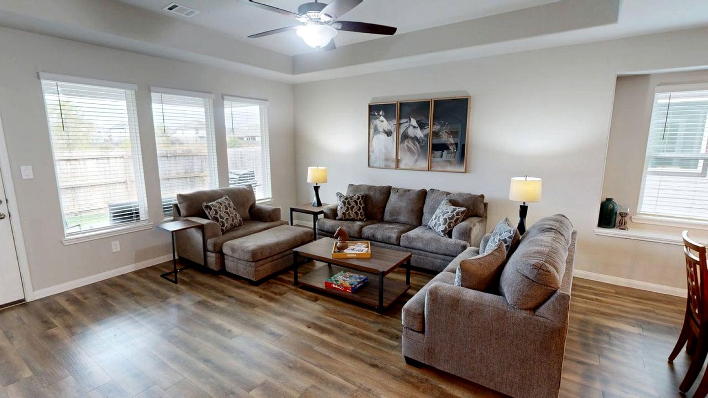 Serene Backyard Escape with Covered Porch in Bryan, Texas