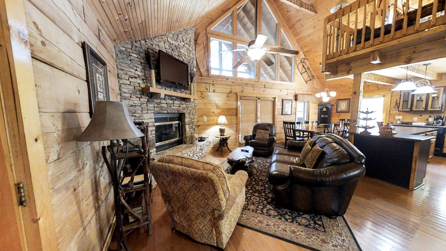Rustic Family Cabin with Hot Tub, Pool Table, and Arcade near Smoky Mountains in Sevierville, Tennessee