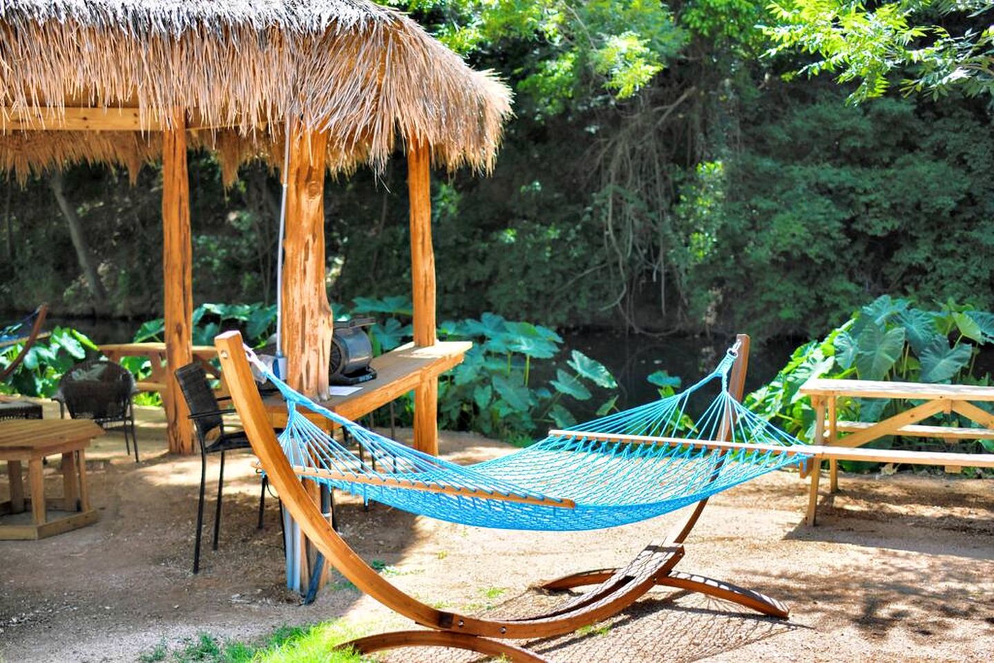 Deluxe Safari Tent Cabin with Creek Swimming, Fishing & Resort-Style Amenities in Marion, Texas