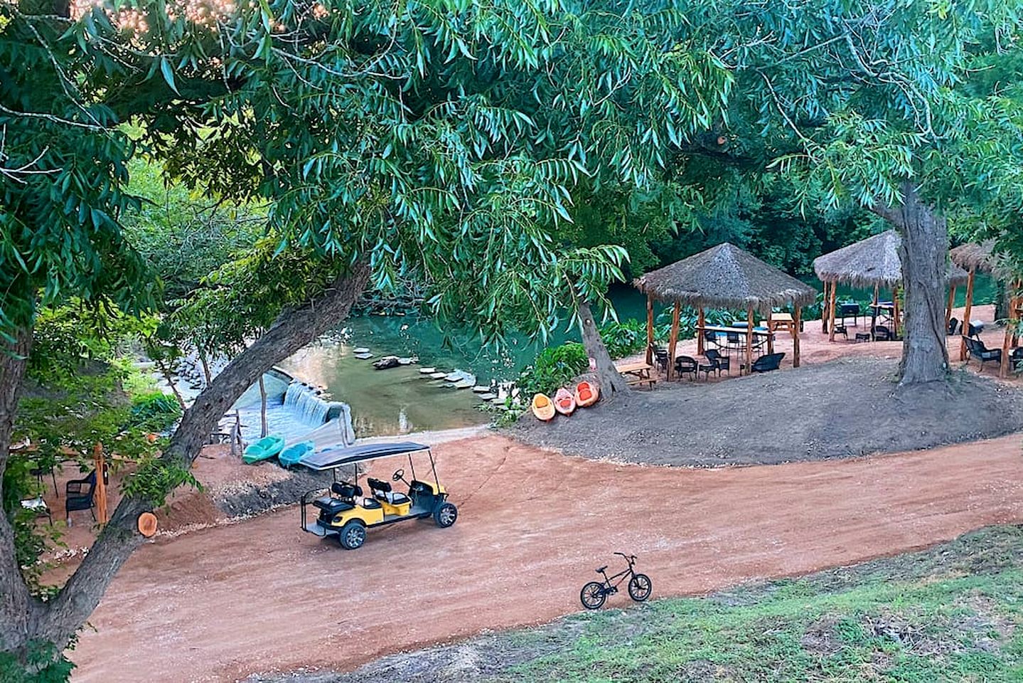 Deluxe Safari Tent Cabin with Creek Swimming, Fishing & Resort-Style Amenities in Marion, Texas