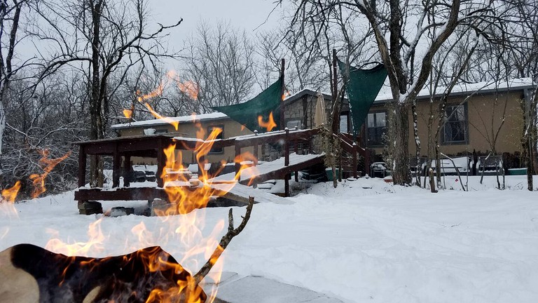 Fire burning outside one of the best farm stays in Missouri.