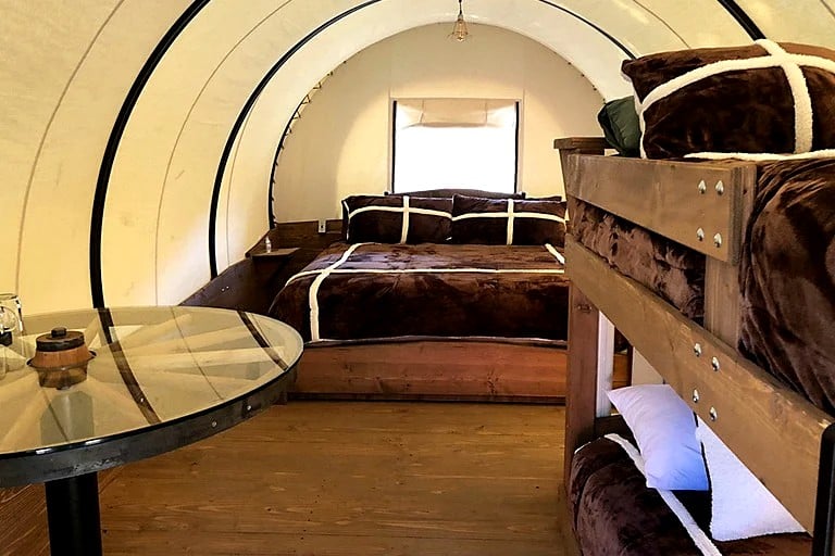 Six-Person Conestoga Wagons for Glamping Getaway near Yosemite National Park, California | Caravans (Groveland, California, United States of America)