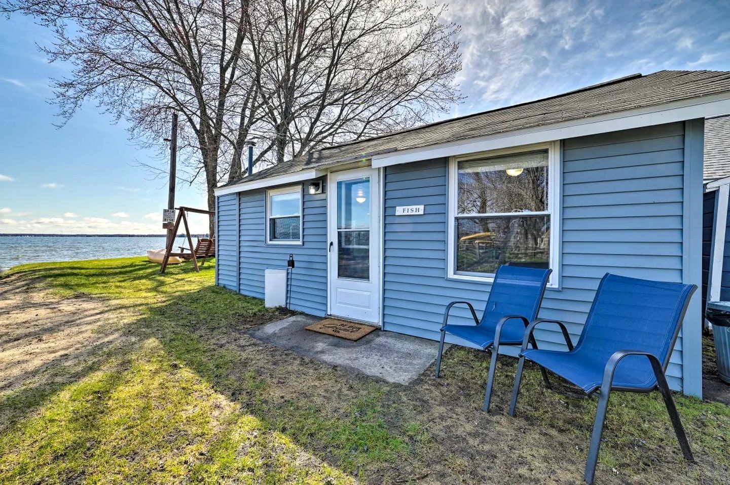 Cozy Lakeside Cabin with Dock & Fire Pit Access in Houghton Lake, Michigan