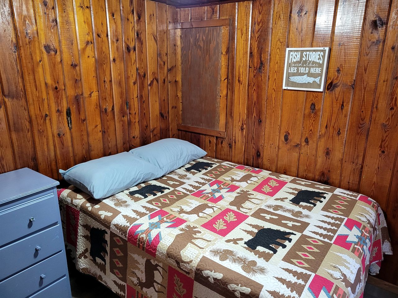 Cozy Lakeside Cabin with Dock & Fire Pit Access in Houghton Lake, Michigan
