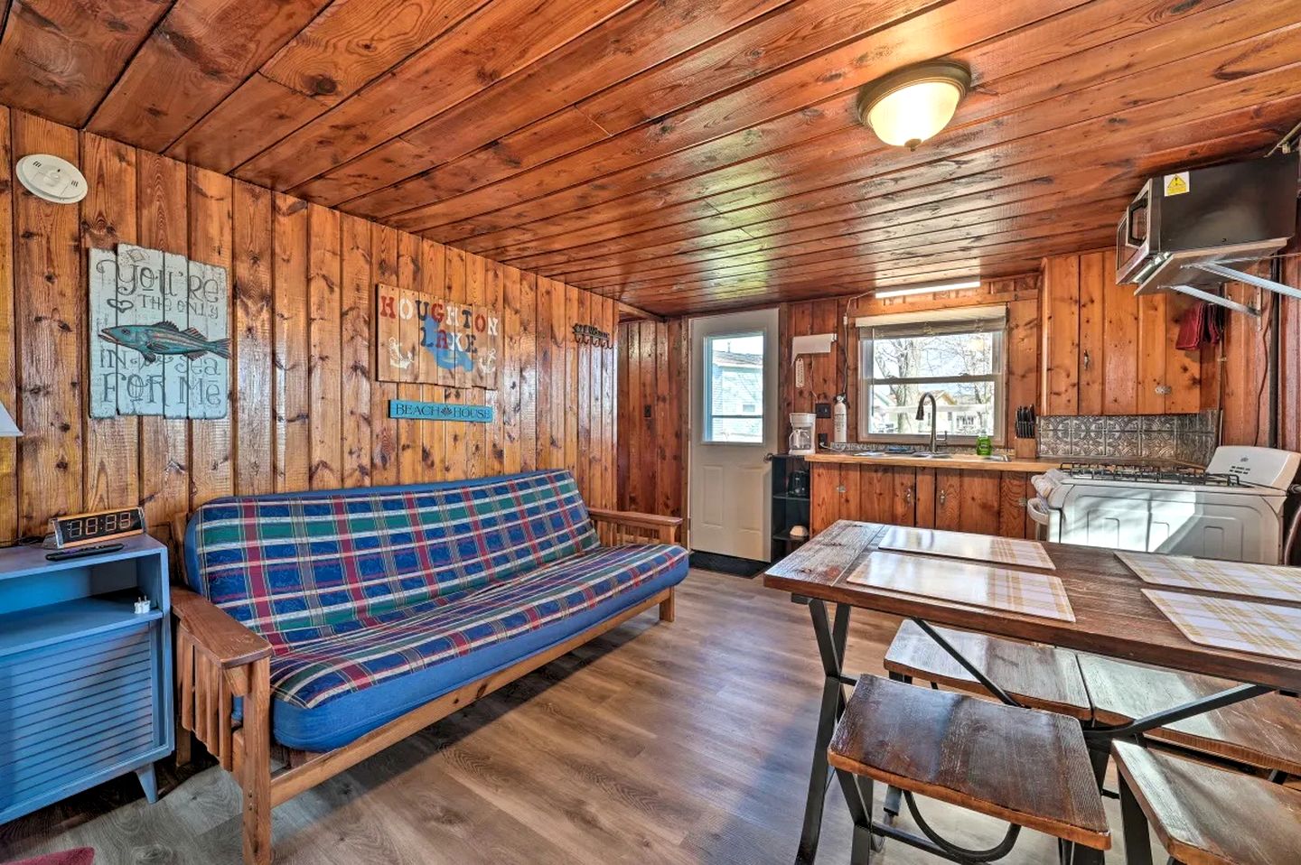Cozy Lakeside Cabin with Dock & Fire Pit Access in Houghton Lake, Michigan