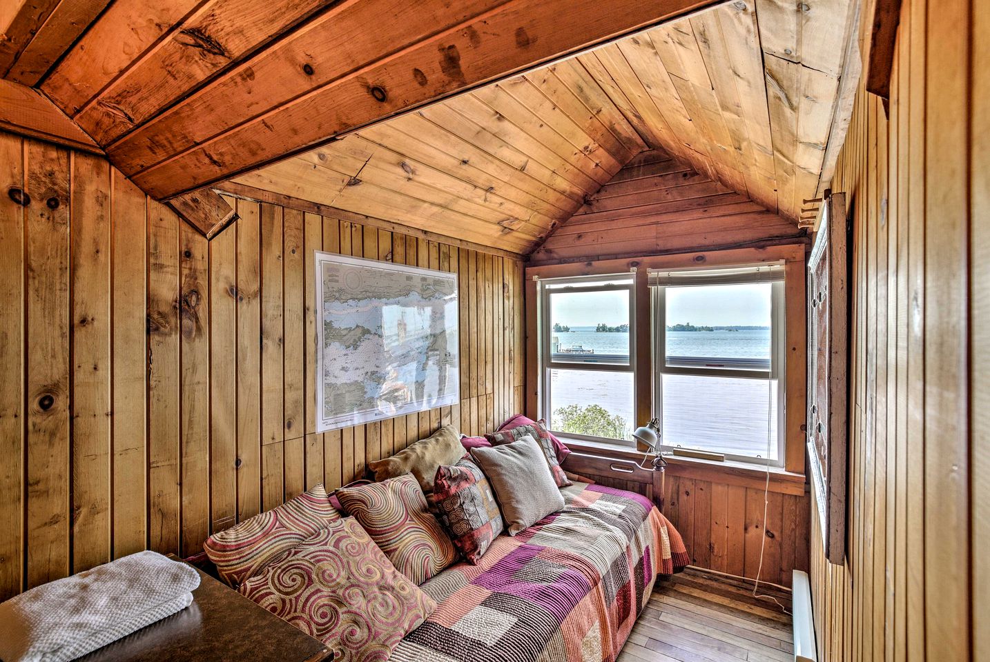 Cozy Bay front Cabin with Private Dock and Charming Outdoor Picnic Space in Hammond, New York