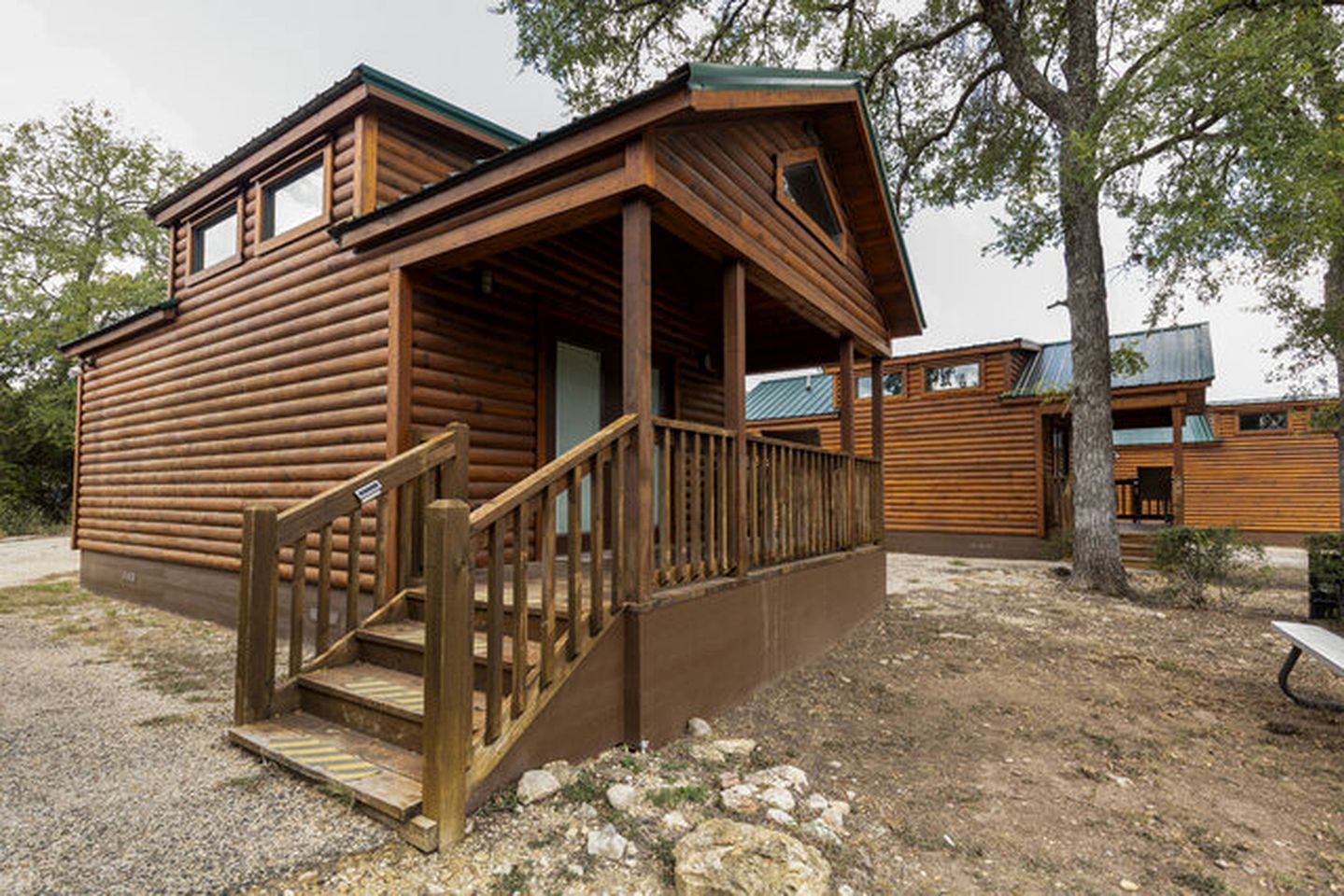 Lovely Log Cabin Rental for Four near San Antonio Texas | Cabins (Pipe Creek, Texas, United States of America)