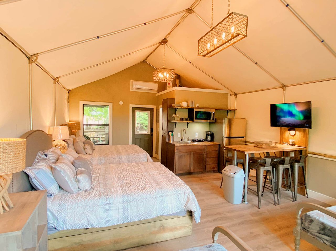 Reconnect by the Water: Modern Family Tented Cabin Retreat in Cibolo, TX