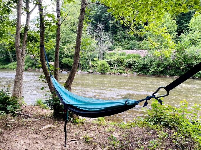 Riverfront Rental with Fire Pit Perfect for Group Glamping near Asheville, North Carolina | Bell Tents (Green Mountain, North Carolina, United States