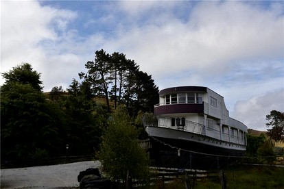 Romantic Getaway Accommodation on a World War II Ship near Waitomo Caves, North Island photo 4