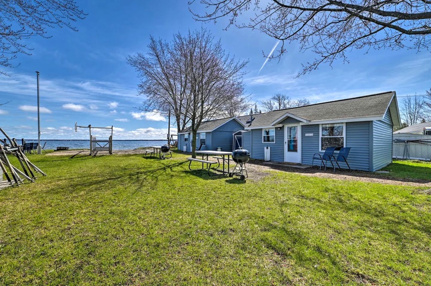 Pet-Friendly Lake Cabin with Dock & Kayaks & Fire Pit in Houghton Lake, Michigan