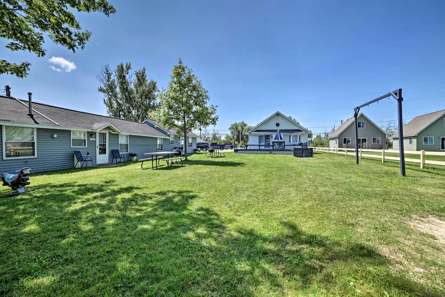 Pet-Friendly Lake Cabin with Dock & Kayaks & Fire Pit in Houghton Lake, Michigan