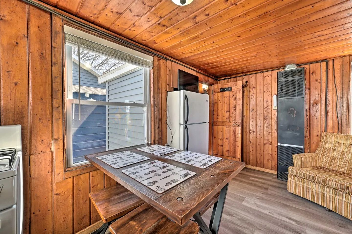 Pet-Friendly Lake Cabin with Dock & Kayaks & Fire Pit in Houghton Lake, Michigan