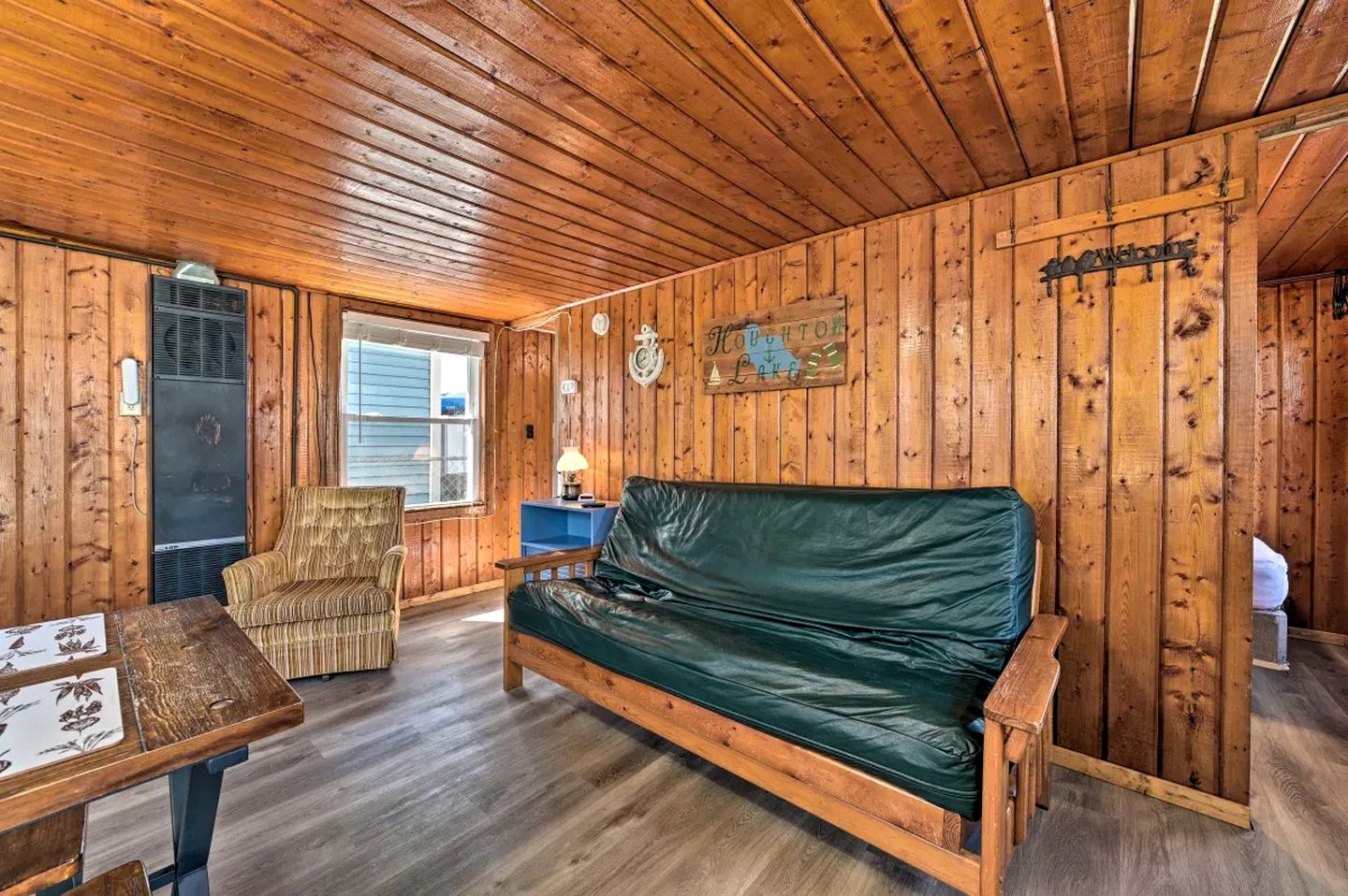 Pet-Friendly Lake Cabin with Dock & Kayaks & Fire Pit in Houghton Lake, Michigan