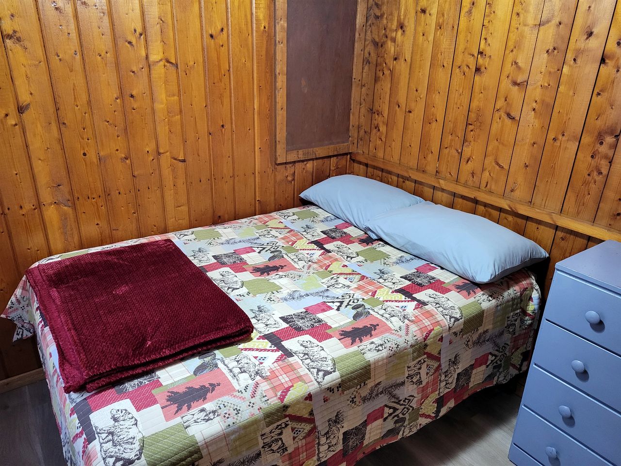 Pet-Friendly Lake Cabin with Dock & Kayaks & Fire Pit in Houghton Lake, Michigan