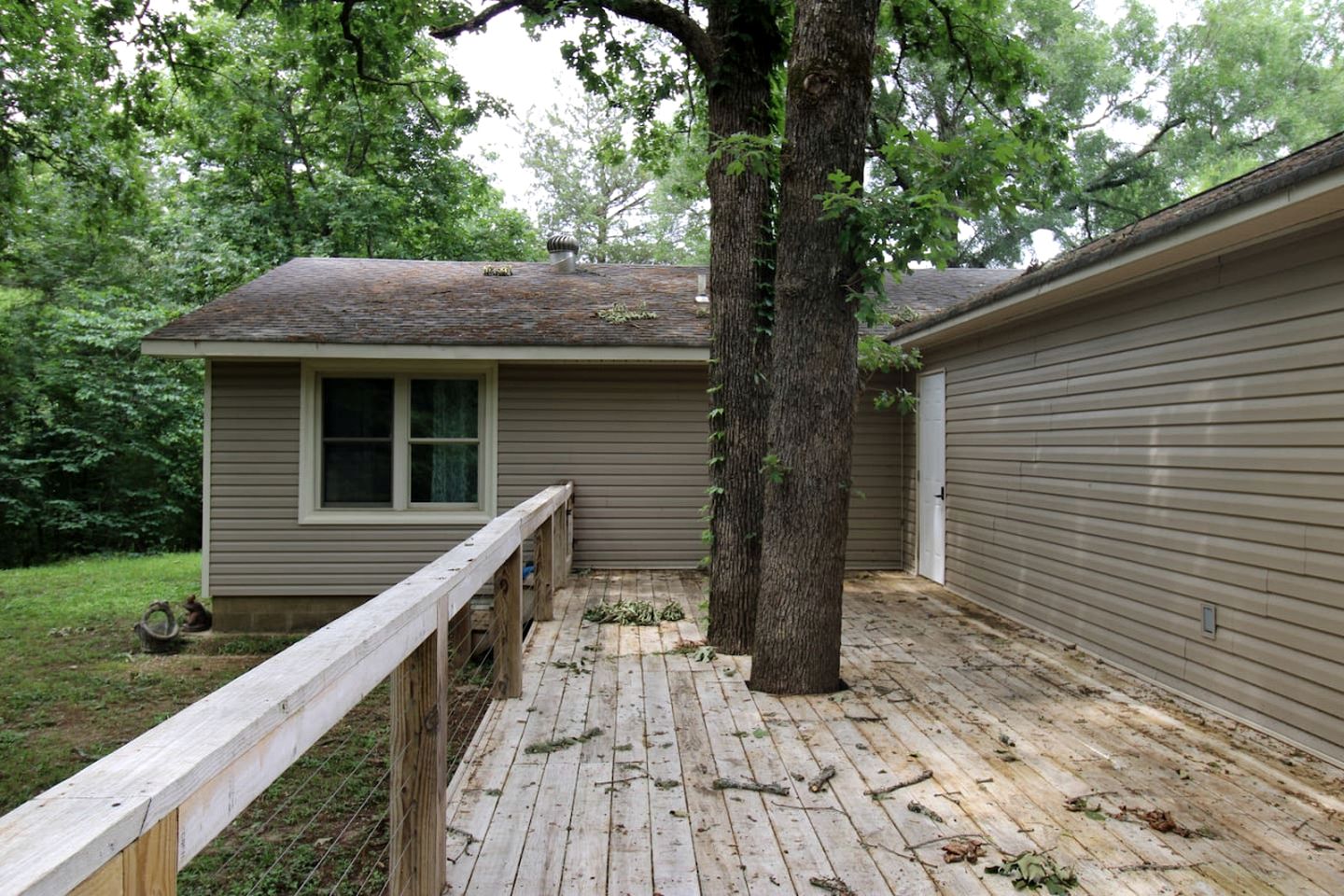 Charming Cottage Nestled Amidst Trees in Hot Springs, Arkansas