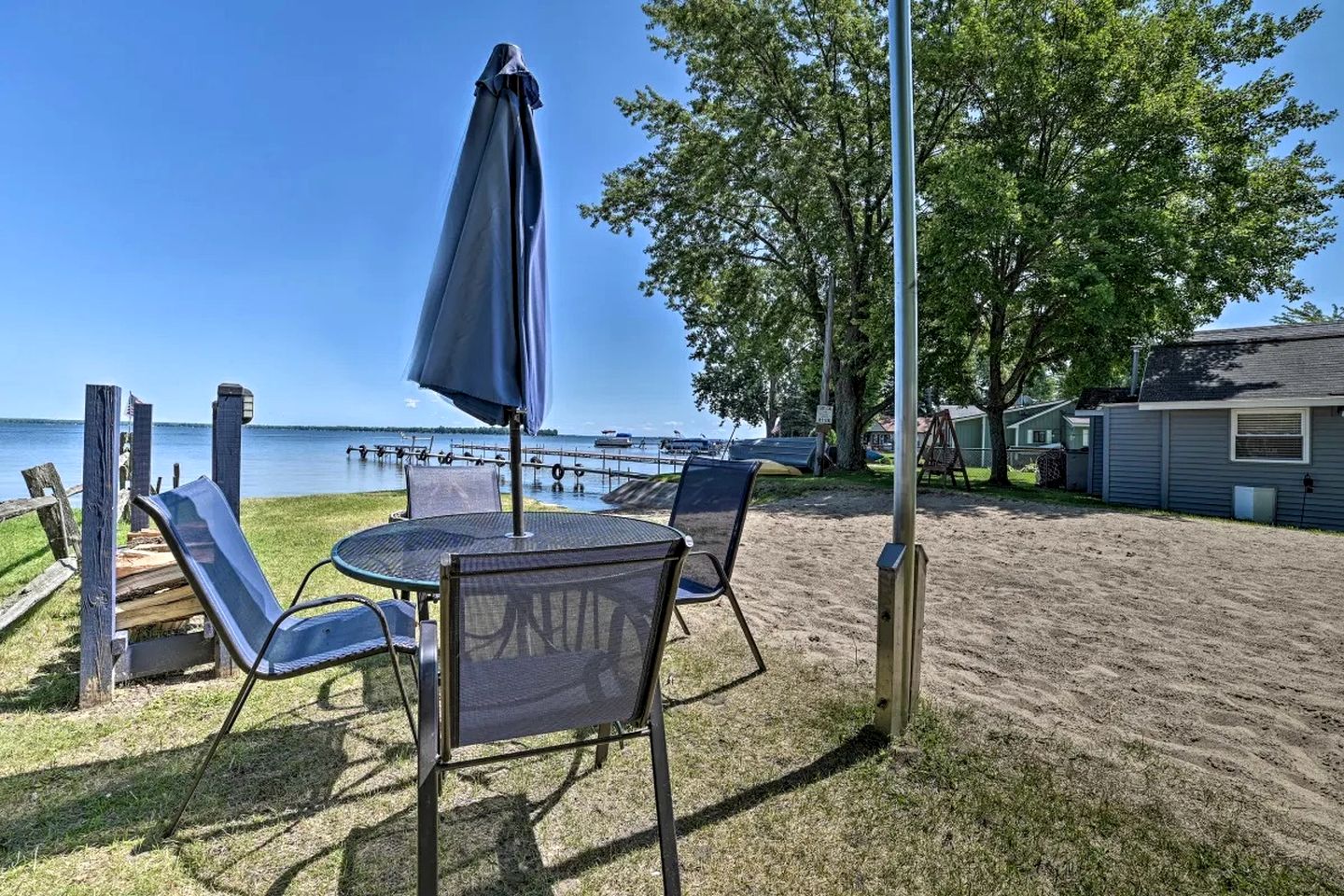 Lakefront Cottage with Fire Pit, Beach & Pet Friendly in Houghton Lake, Michigan