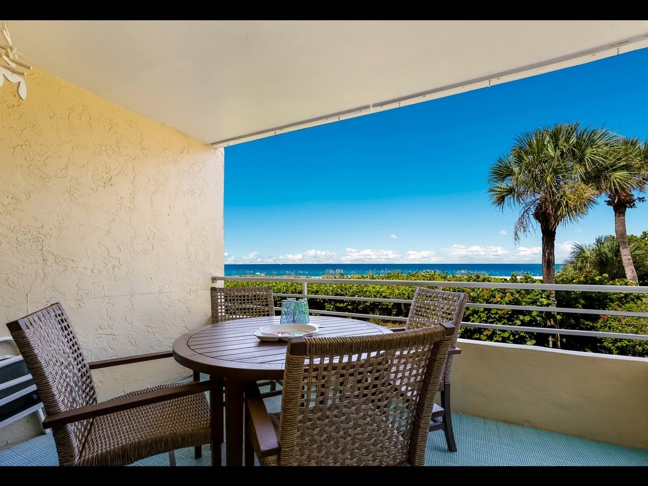 Beachfront Getaway with Stunning Ocean Views and Private Balcony on Anna Maria Island, Florida