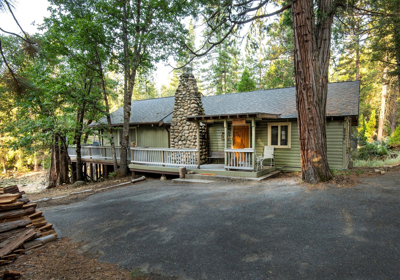 Serene Cottage Surrounded by Pine Trees on the Merced River in Yosemite Valley