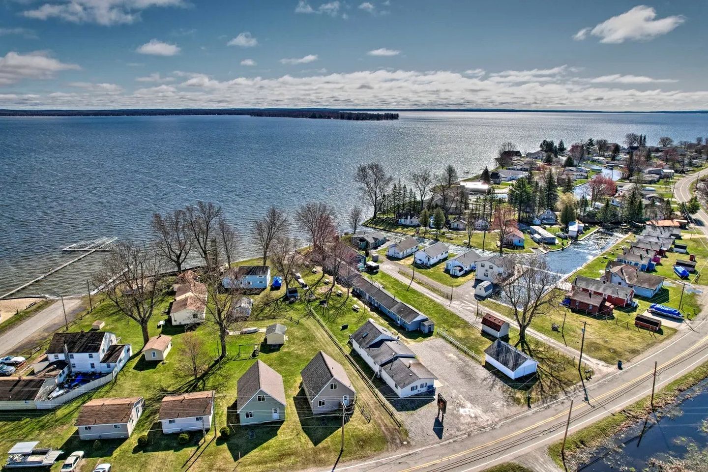 Waterfront Cabin with Kayaks, Dock & Fire Pit in Houghton Lake, Michigan