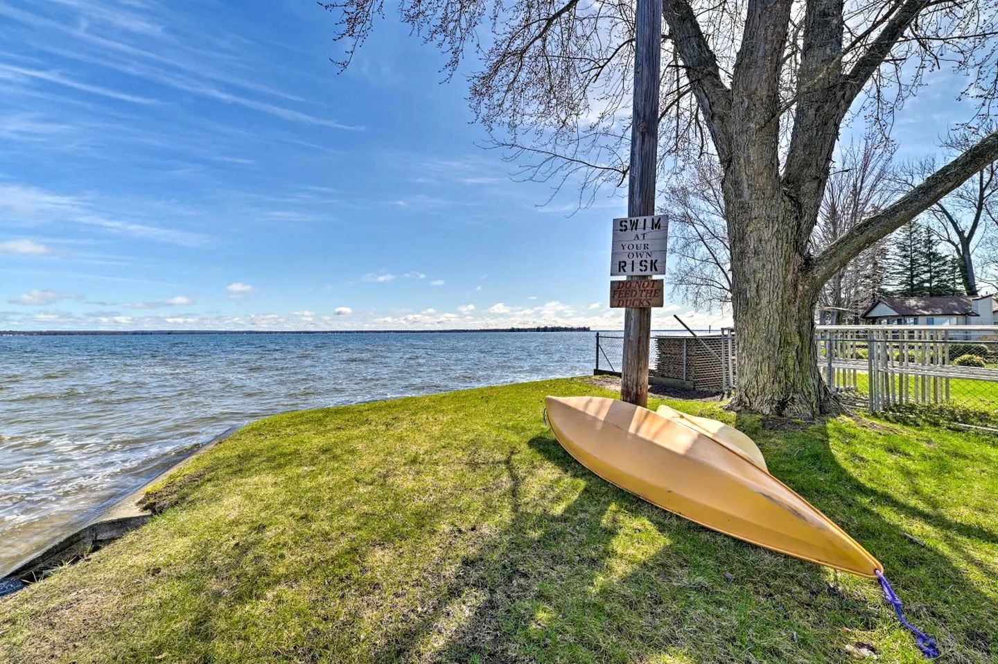 Waterfront Cabin with Kayaks, Dock & Fire Pit in Houghton Lake, Michigan