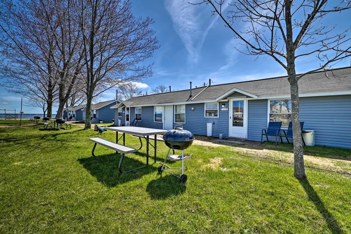 Waterfront Cabin with Kayaks, Dock & Fire Pit in Houghton Lake, Michigan