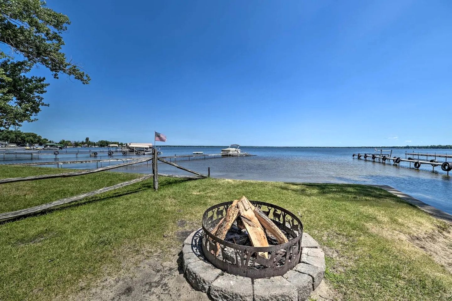 Waterfront Cabin with Kayaks, Dock & Fire Pit in Houghton Lake, Michigan