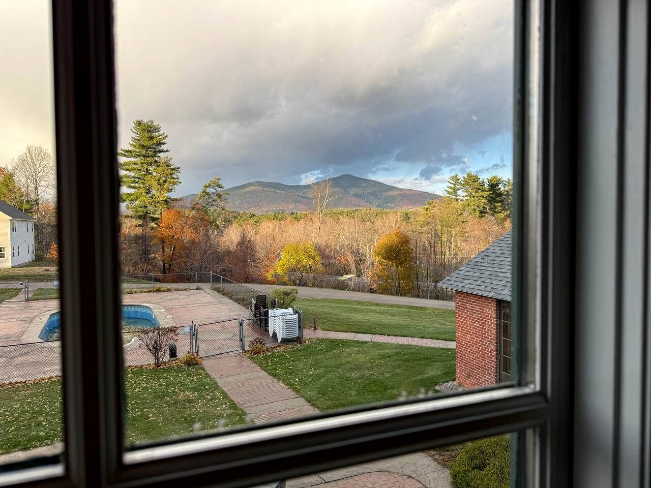 Charming Brick Retreat with Hot Tub & Mountain Views in Conway, New Hampshire