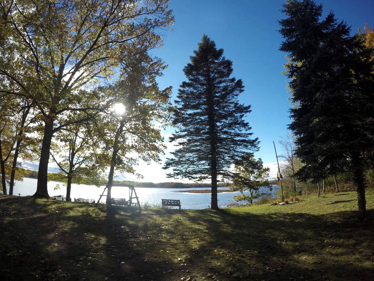 Secluded Lake Cottage Rental with a Dock and a Game Room in Hale, Michigan