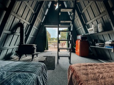 Rustic A-Frame Glamper near Nashville with Memory Foam Beds, Fire Pit & Country Breakfast photo 3