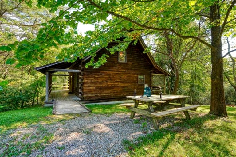 Escape to Logan, Ohio, in this Wonderful Log Cabin for Four with a Hot Tub and Pond