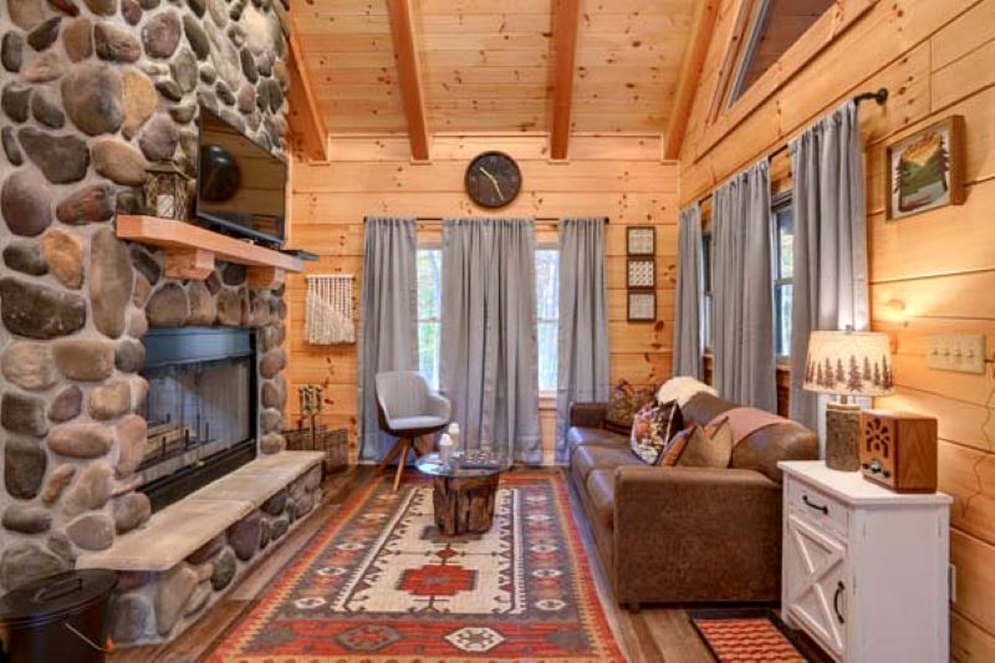 Romantic Getaways to this Rustic Cabin Rental with Stone Fireplace in Logan, Ohio